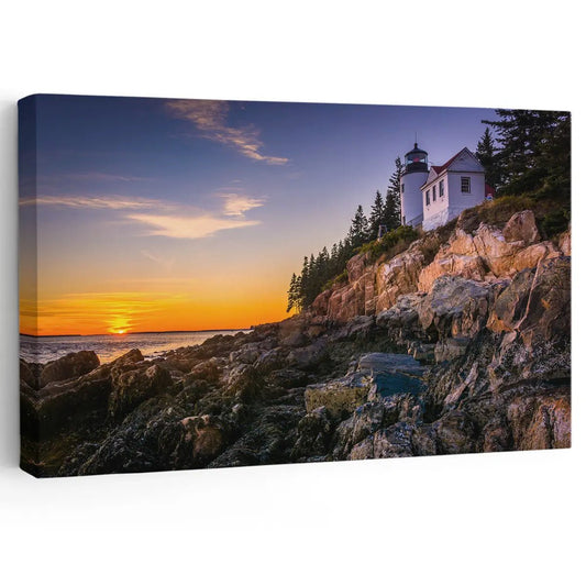 Golden-hour lighthouse cliff scene canvas wall art for living room spaces, creating a peaceful coastal atmosphere.