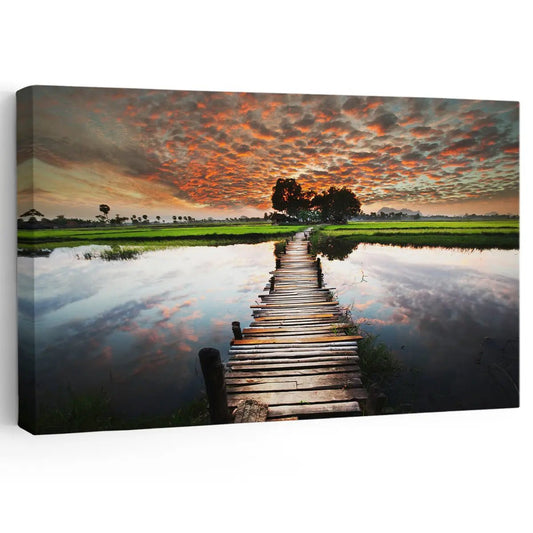 Old wooden dock at sunset canvas wall art for creating a calming living room retreat with warm orange clouds and serene reflective lake tones