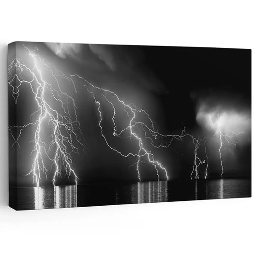 Lightning over ocean waves — large canvas wall art for living room, black and white seascape adds bold drama to modern interiors.