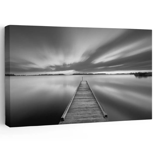 Minimalist pier over calm ocean — coastal canvas print for living room, black and white tones evoke peace and modern sophistication.