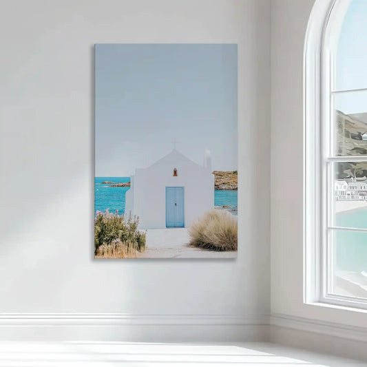 Seaside white chapel — large canvas wall art featuring blue accents and sunlight hues, calming artwork for bedroom or hallway wall placement