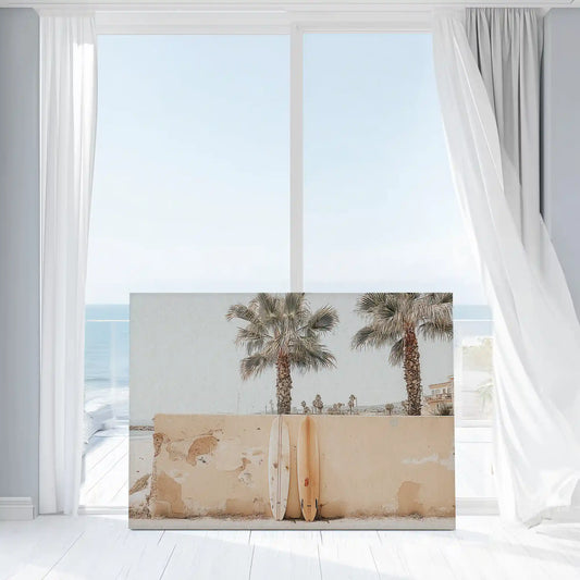 Vintage surfboards against stucco wall — modern canvas wall art capturing relaxed coastal vibe for living room design