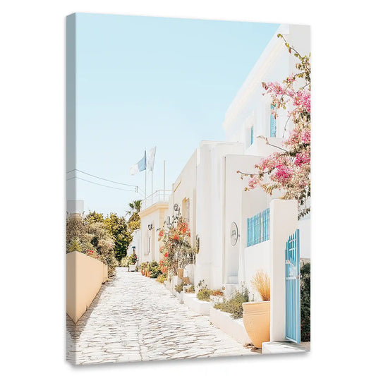 Whitewashed Mediterranean street view — coastal canvas print for living room, peaceful charm with blue and pink bougainvillea.