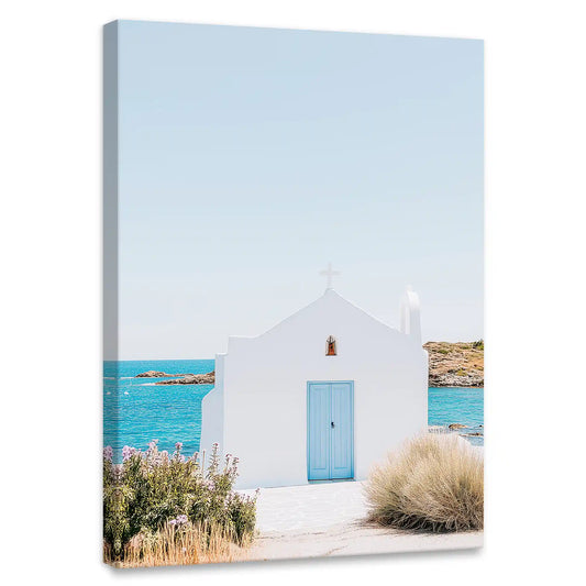 Greek island chapel — coastal canvas wall art with whitewashed walls and soft ocean tones, peaceful Mediterranean decor for living room design