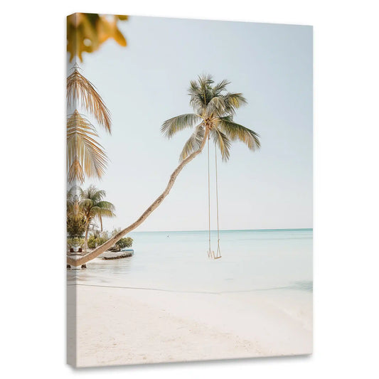 Palm tree and swing coastal canvas print for living room wall — soft neutral tones evoke calm tropical beach serenity.