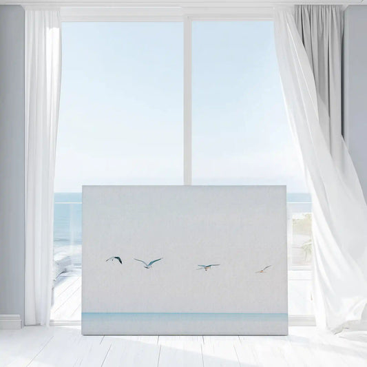 Four seagulls gliding — modern canvas wall art, tranquil sky and sea palette ideal for coastal or minimalist home interiors.