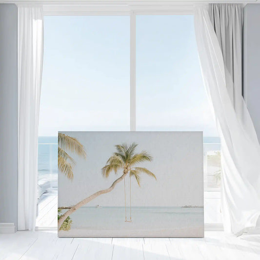Minimalist tropical scene with hammock and palms — modern canvas wall art bringing calm coastal energy to living room décor