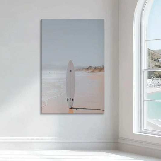 White surfboard on sand — modern canvas wall art with soft pastel hues, perfect for coastal home or beach house interiors