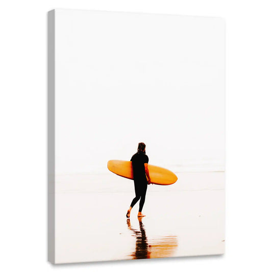 Surfer with yellow board — coastal canvas print for living room or bedroom, capturing warm sunlight and relaxed ocean vibes