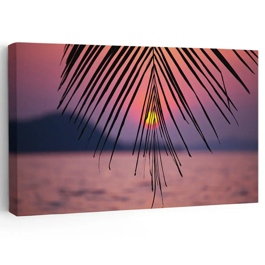 Palm tree sunset coastal canvas print for living room wall — tranquil orange and pink tones evoke a serene tropical mood.