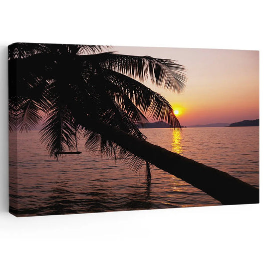 Palm tree silhouette at sunset canvas wall art for bedroom—tropical coastal scene with orange sky and calm ocean waters