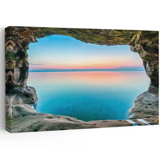 Sunset cave view — large canvas wall art with glowing horizon and tranquil sea, calming coastal décor for modern living room interiors
