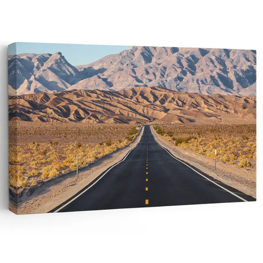 Desert highway leading to mountain peaks canvas wall art for living room décor, adding a peaceful warm atmosphere to modern interiors