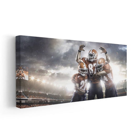 Dynamic football players in modern palette — large canvas art with bold lighting, ideal for uplifting office décor or game-room styling