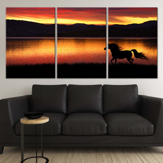 Majestic horse running at sunset — modern canvas wall art for living room, warm orange tones creating an inspiring atmosphere.