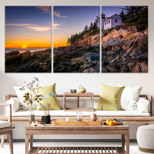 Sunset lighthouse seascape in warm pastel tones — large canvas wall art, perfect for calming bedroom décor arrangements.