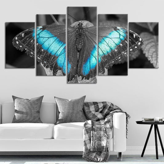 Blue monarch butterfly — modern canvas wall art for living room, striking contrast of aqua and gray tones creating uplifting décor.