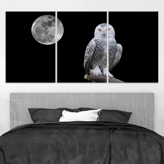 Snowy owl with full moon — canvas wall art for a calming bedroom, adding peaceful monochrome style and modern wildlife elegance.
