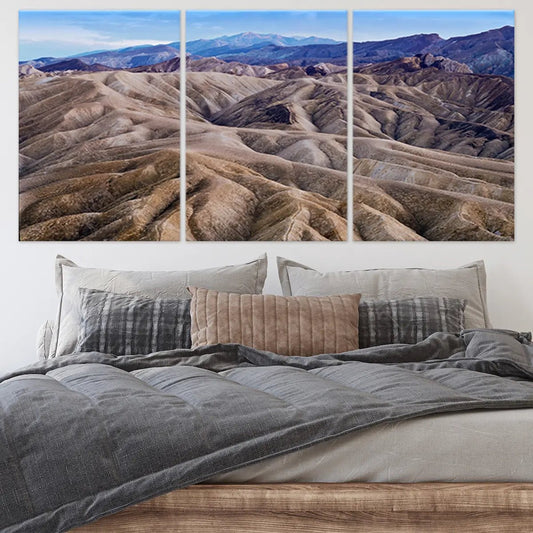 Rugged canyon ridges under blue sky — contemporary canvas wall art in warm desert palette ideal for creating a tranquil bedroom retreat