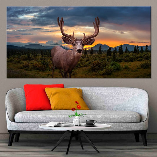 Majestic deer at sunset — large canvas wall art for living room, rustic wildlife scene with warm orange hues for cozy natural décor.