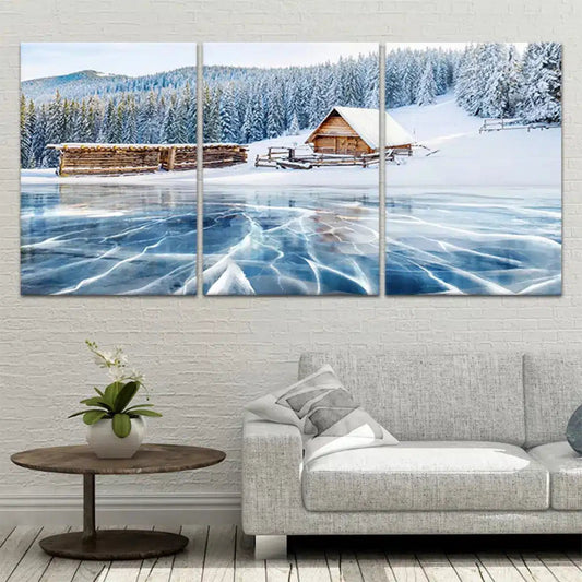 Snowy forest cabin and frozen lake horizon — modern canvas wall art with cool blue palette ideal for creating a serene bedroom atmosphere