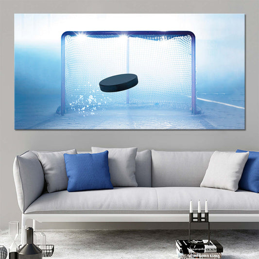 Hockey goalpost scene canvas wall art for living room, featuring a puck in motion and cool blue tones that create an inspiring sporty atmosphere