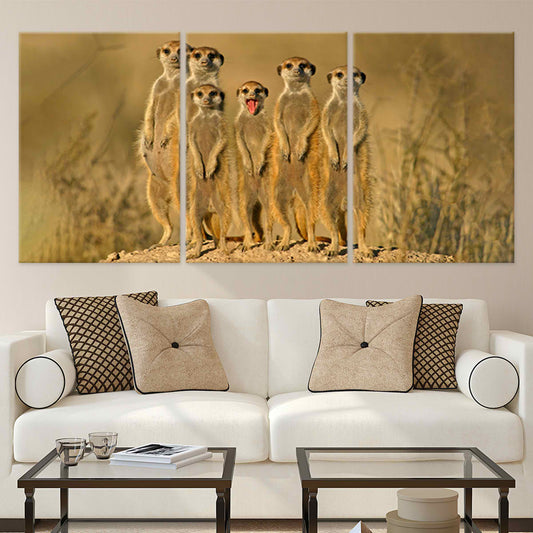 Meerkat family standing in golden grass—canvas wall art for modern living room decor, adding an inspiring wildlife accent with warm earthy tones