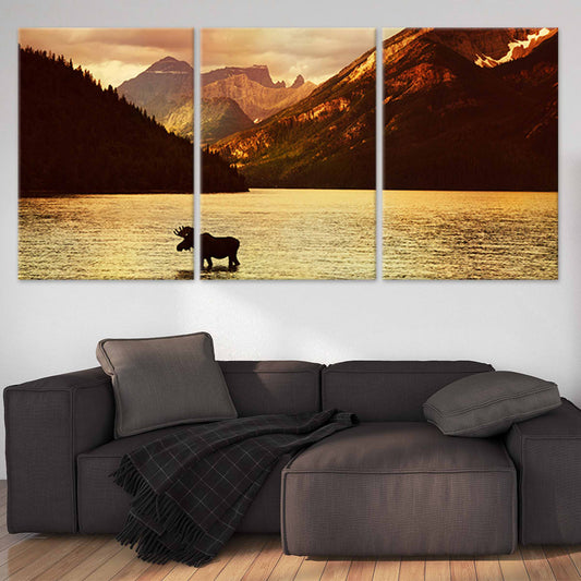 Moose standing in tranquil lake — modern canvas wall art for living room, warm golden tones creating a peaceful mountain atmosphere.