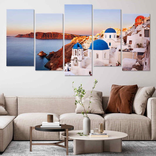 Santorini coastal houses — large canvas wall art with sunset glow and sea view, peaceful and inspiring addition to bedroom interiors.