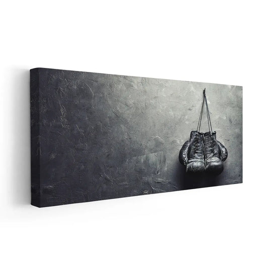 “Vintage boxing gloves large canvas wall art in rustic grayscale tones, creating an uplifting statement piece ideal for office or gym spaces.”