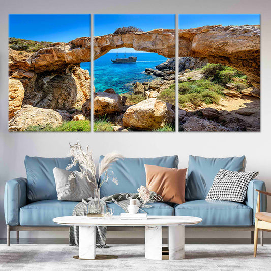 Rustic coastal rock arch — large canvas art in warm earth tones and aqua water, perfect for calming bedroom décor with natural seaside charm