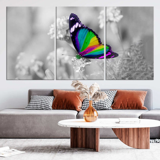 Rainbow butterfly canvas wall art for living room décor, adding an uplifting pop of color that brightens modern spaces with a joyful artistic touch.