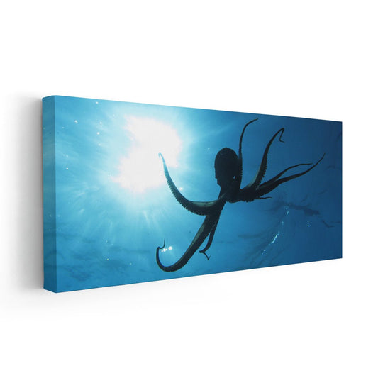 Deep sea octopus floating in glowing light—large canvas wall art ideal for bedroom styling, creating a calming and immersive underwater atmosphere