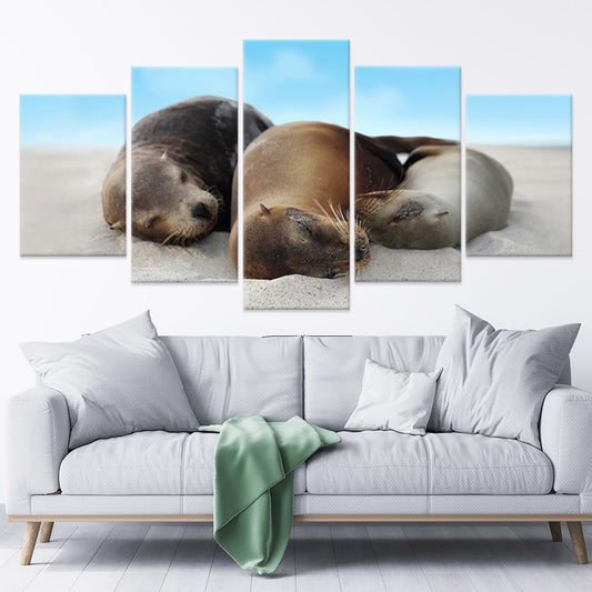 Sea lion family resting on the sand—canvas wall art for peaceful living room decor, adding a soft coastal vibe and warm emotional touch to the space