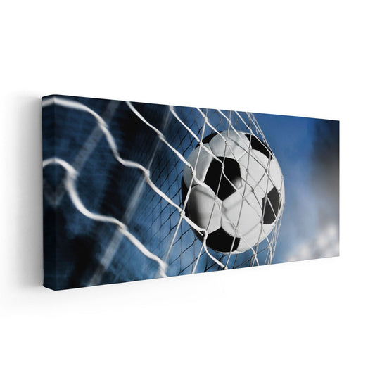“Goal-shot soccer moment large canvas wall art in bold blue tones, adding uplifting energy ideal for office or gaming room sports displays.”