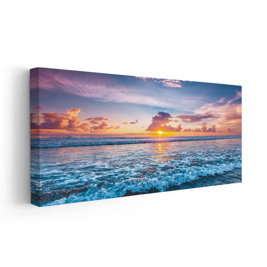 Vibrant ocean sunset canvas wall art for living room—golden sky reflecting over calm blue waves, creating a peaceful coastal seascape