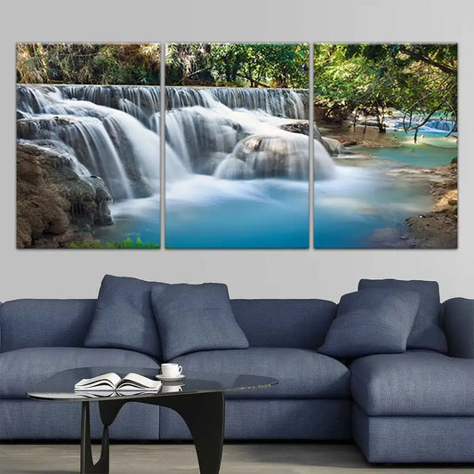 Cascading jungle waterfall in soft blue palette — large canvas wall art adding uplifting natural beauty to a serene bedroom environment