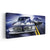 Two Vintage Cars Racing Canvas Wall Art
