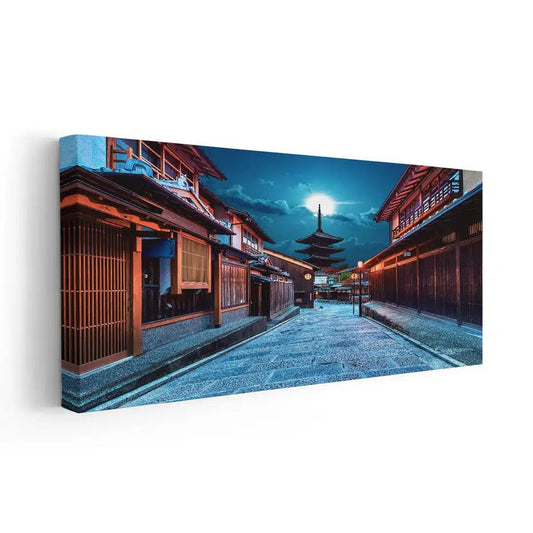 Historic Yasaka Pagoda illuminated at dusk — modern canvas wall art with deep blue palette for bedroom or office design