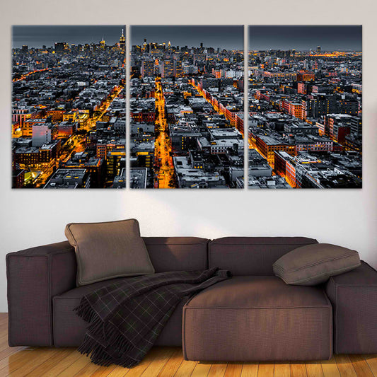 Manhattan skyline at night large canvas wall art for living room adds inspiring city glow and modern New York elegance to décor.