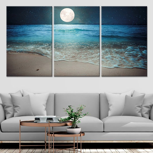 Moonlit ocean shoreline — modern canvas wall art, glowing horizon and deep teal sea create a tranquil beach-inspired ambiance.