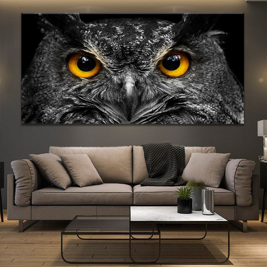 Gold-eyed owl close-up — modern canvas wall art, dark neutral tones and sharp detail creating bold sophistication for living rooms.