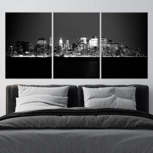 New York City skyline at night — modern canvas wall art for living room, black and white design with elegant city lights.