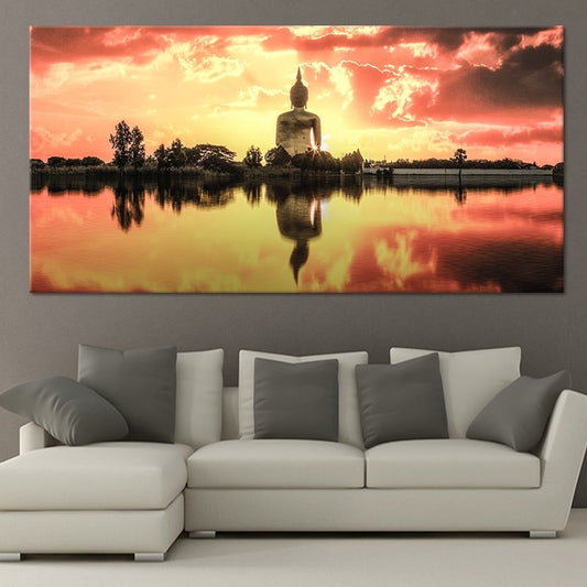 Sunset Buddha reflection canvas wall art for living room, peaceful meditation scene with warm golden tones and tranquil water balance