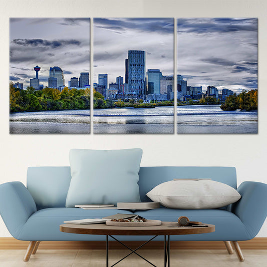 Calgary skyline — large canvas wall art for living room, featuring peaceful river reflections and modern blue-gray city tones.