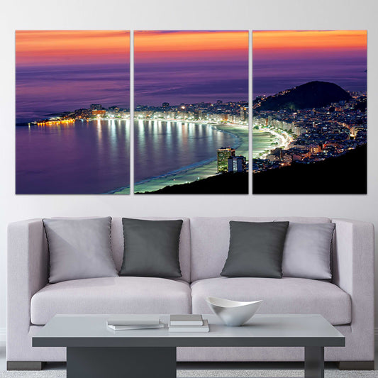 Copacabana Beach skyline at night — large canvas wall art with glowing ocean lights for living room or modern decor.