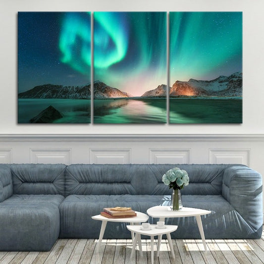 Northern lights drifting above snowy peaks — Large canvas art in cool blue palette adding inspiring bedroom décor and serene evening mood