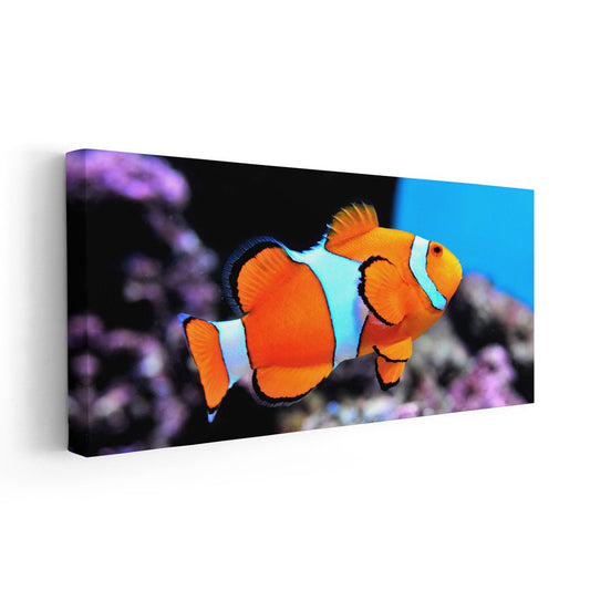Coral reef clownfish in bold blue palette — modern canvas wall art perfect for office décor, enhancing rooms with lively aquatic energy and color