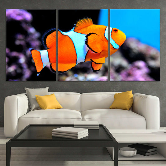 Clown fish canvas wall art for living room décor, adding a vibrant coastal touch with bright orange tones that create an uplifting tropical atmosphere