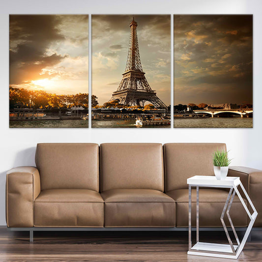 Eiffel Tower and bridge — large canvas wall art with golden sunset tones, romantic Paris décor perfect for elegant living room spaces.